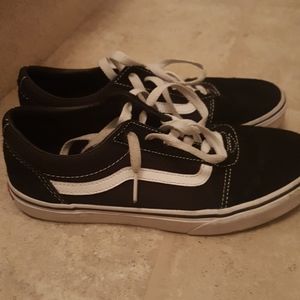 Black and white suade vans